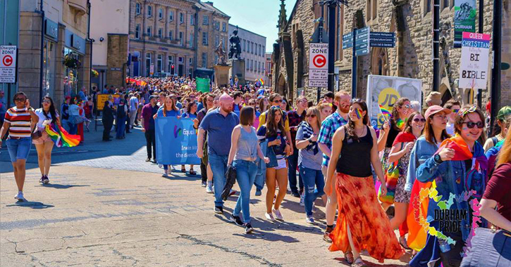 Durham pride parade making its way from durham cathedral to the sands